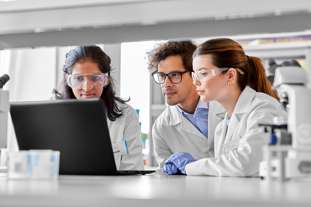 3 lab people viewing computer